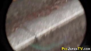 Spied on asian urinates