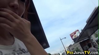 Asian pisses for voyeur in public